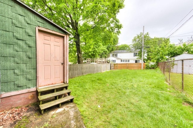 view of yard with entry steps