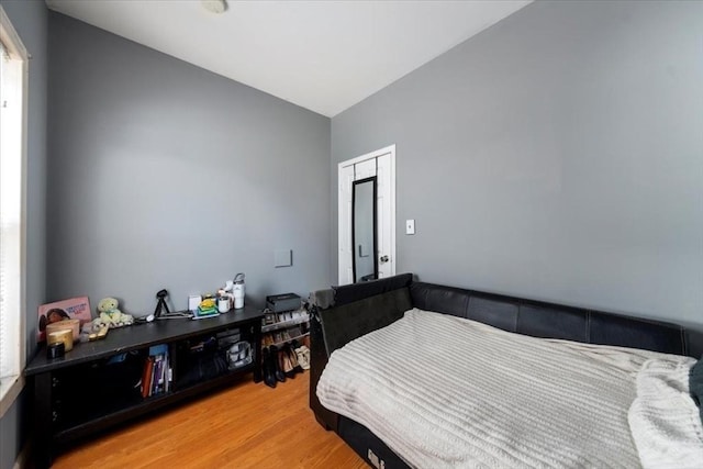 bedroom with light wood-type flooring