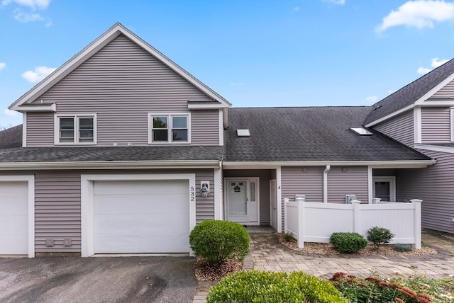 front of property with a garage