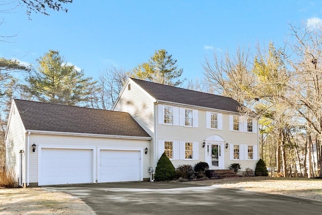 colonial house featuring a garage