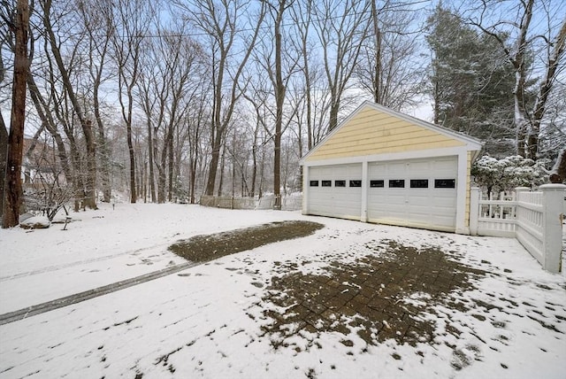 view of snow covered garage