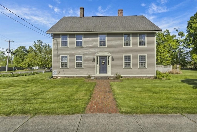 685 Main St, Wilbraham, MA 01095 - colonial inspired home with a chimney and a front yard