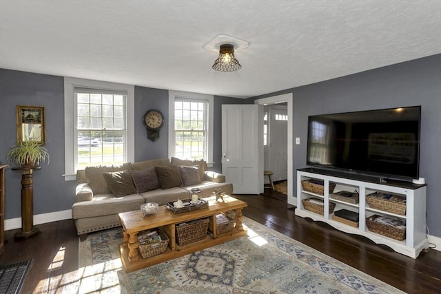 685 Main St, Wilbraham, MA 01095 - living area with wood finished floors, baseboards, and a textured ceiling