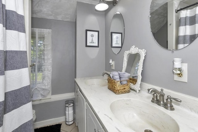 685 Main St, Wilbraham, MA 01095 - bathroom featuring a shower with shower curtain, double vanity, and tile patterned flooring