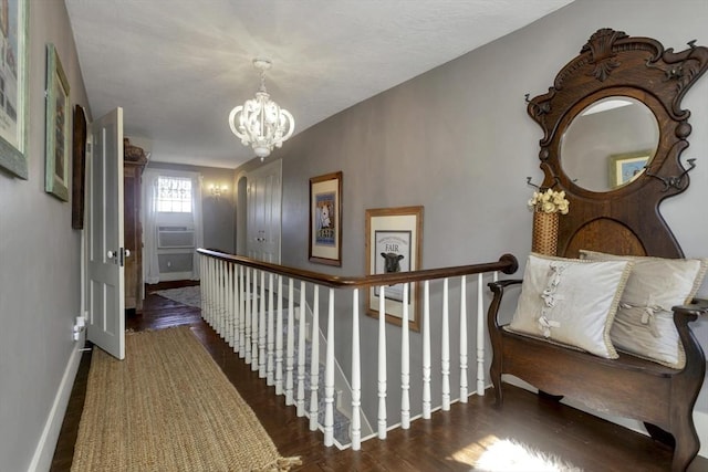 685 Main St, Wilbraham, MA 01095 - hallway featuring an upstairs landing, a chandelier, wood finished floors, and baseboards