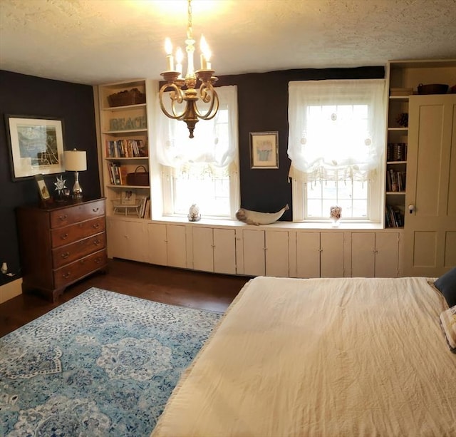 685 Main St, Wilbraham, MA 01095 - bedroom featuring a chandelier, wood finished floors, and a textured ceiling