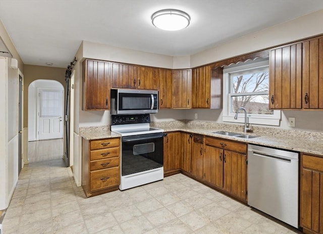 kitchen featuring appliances with stainless steel finishes and sink