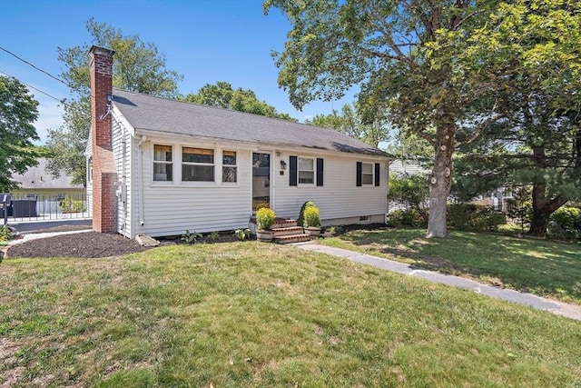 11 Worcester Pl, Holbrook, MA 02343 - view of front of home with a chimney and a front yard
