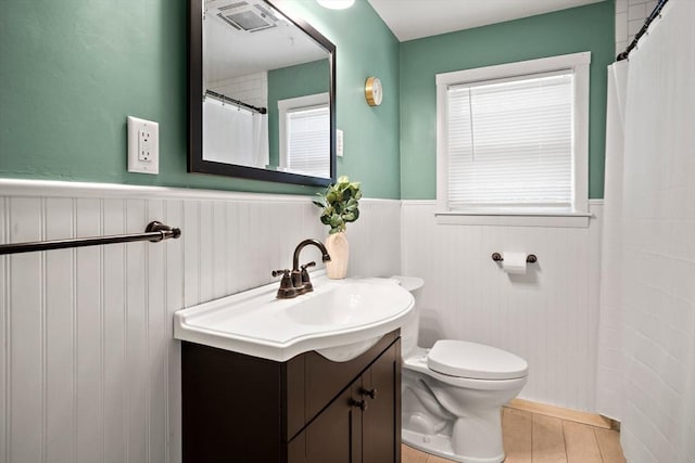 11 Worcester Pl, Holbrook, MA 02343 - full bathroom with a wainscoted wall, vanity, and curtained shower
