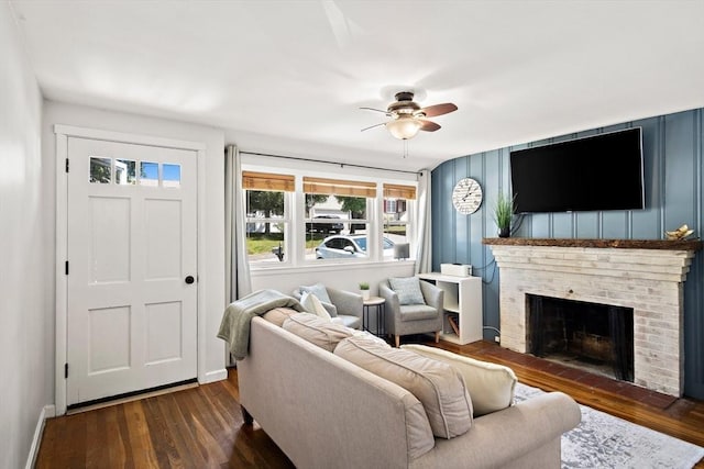 11 Worcester Pl, Holbrook, MA 02343 - living area with ceiling fan, dark wood finished floors, and a fireplace