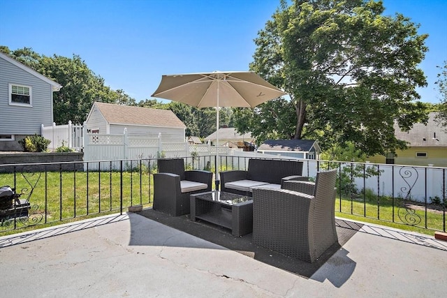 11 Worcester Pl, Holbrook, MA 02343 - view of patio with an outdoor living space and a storage shed