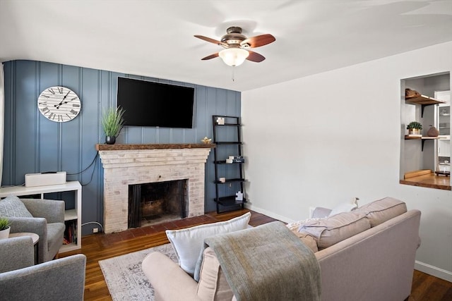 11 Worcester Pl, Holbrook, MA 02343 - living room featuring a ceiling fan, a brick fireplace, and wood finished floors