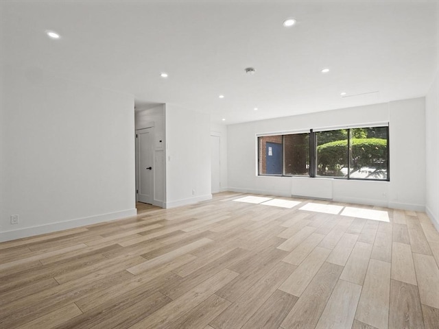 22 Chestnut Pl Unit G1, Brookline, MA 02445 - empty room with light wood-style floors and recessed lighting