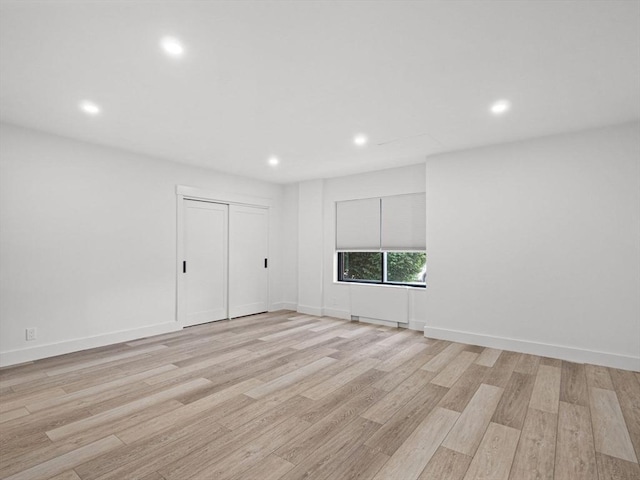 22 Chestnut Pl Unit G1, Brookline, MA 02445 - empty room featuring light wood-type flooring and recessed lighting