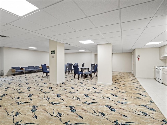 22 Chestnut Pl Unit G1, Brookline, MA 02445 - finished below grade area featuring a paneled ceiling and baseboards