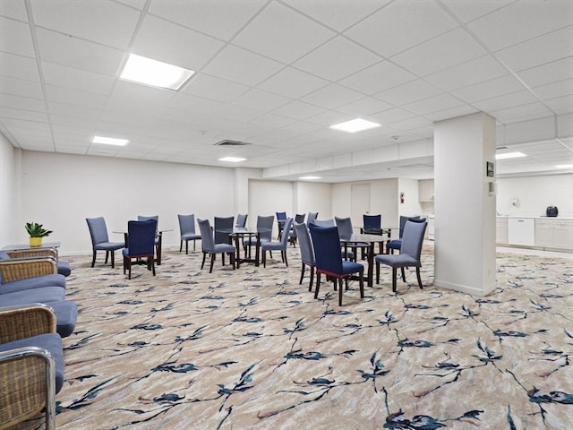 22 Chestnut Pl Unit G1, Brookline, MA 02445 - dining space featuring a paneled ceiling and carpet floors