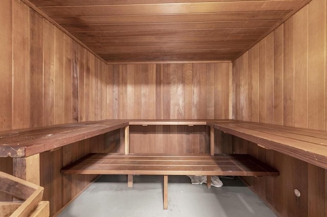 22 Chestnut Pl Unit G1, Brookline, MA 02445 - relaxing sauna / steam room with wooden walls, wooden ceiling, and concrete flooring