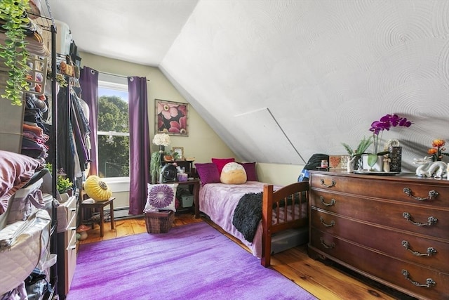 4 Myrtle Sq, Gloucester, MA 01930 - bedroom with wood finished floors and vaulted ceiling