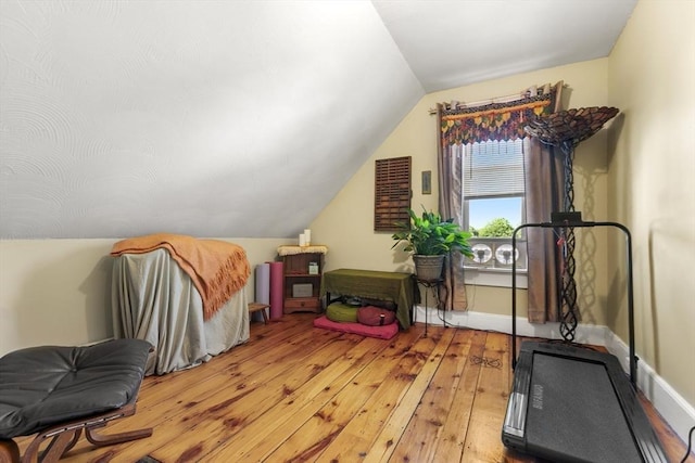 4 Myrtle Sq, Gloucester, MA 01930 - workout area featuring light wood-style floors, vaulted ceiling, and baseboards