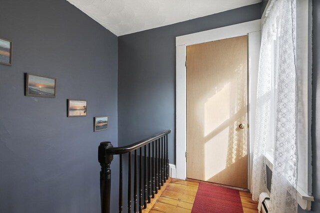 4 Myrtle Sq, Gloucester, MA 01930 - stairway featuring wood finished floors and baseboard heating