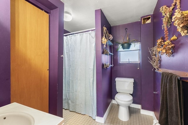 4 Myrtle Sq, Gloucester, MA 01930 - bathroom featuring toilet, vanity, tile patterned floors, baseboards, and a shower with shower curtain