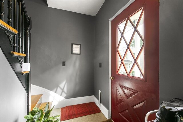 4 Myrtle Sq, Gloucester, MA 01930 - entryway with plenty of natural light, baseboards, and stairs