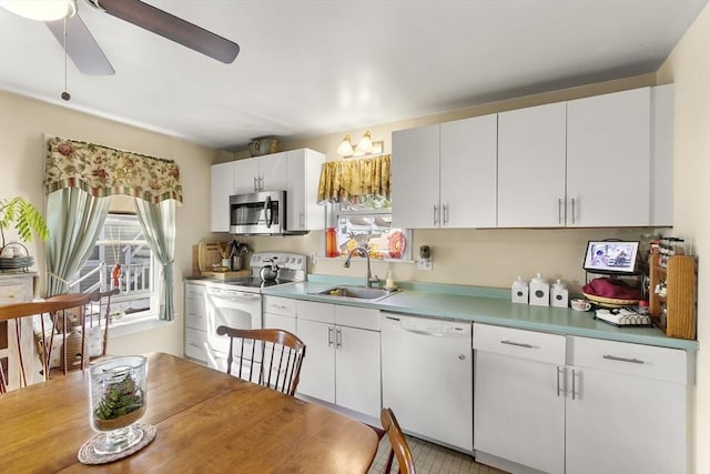 4 Myrtle Sq, Gloucester, MA 01930 - kitchen with white appliances, a sink, healthy amount of natural light, and ceiling fan