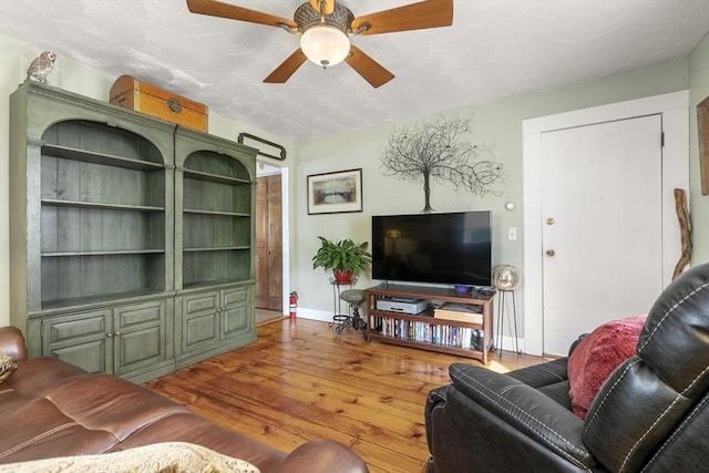 4 Myrtle Sq, Gloucester, MA 01930 - living area with wood finished floors, a ceiling fan, and baseboards