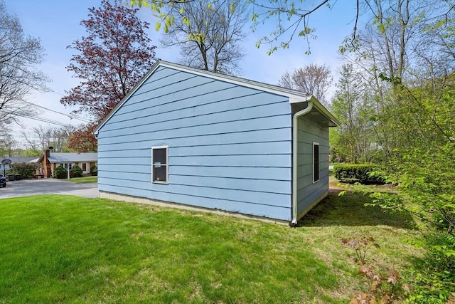 view of home's exterior featuring a yard