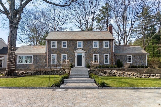 colonial house with a front lawn