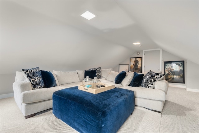 carpeted living room with vaulted ceiling