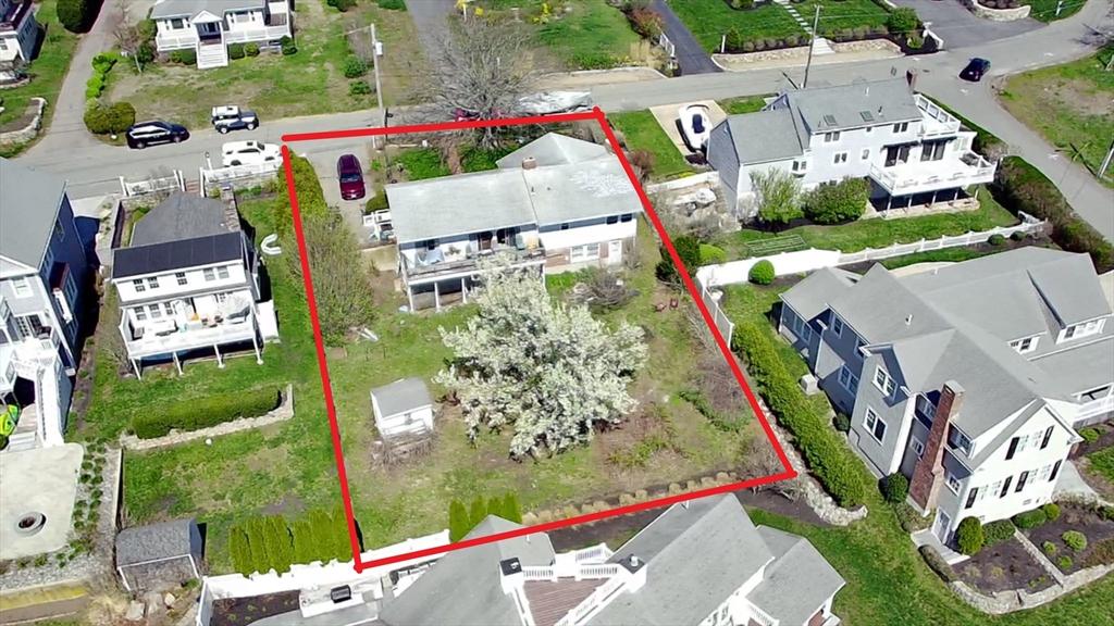 aerial view of residential area featuring property boundaries highlighted