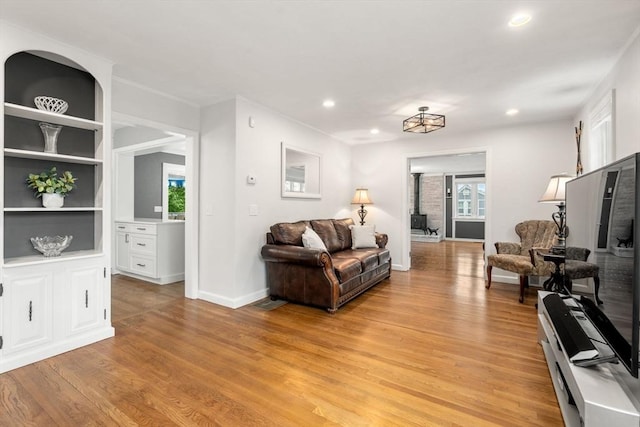 37 Benjamin, Marlborough, MA 01752 - living area featuring plenty of natural light, light wood finished floors, recessed lighting, baseboards, and built in shelves