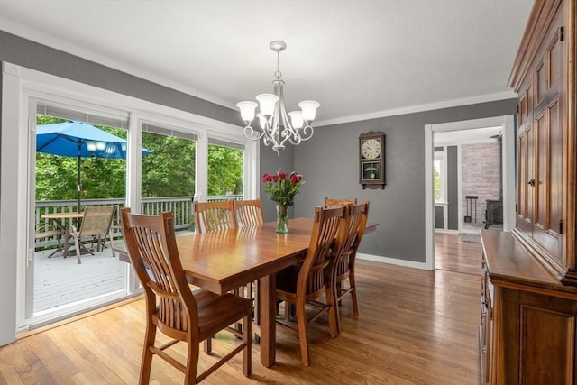 37 Benjamin, Marlborough, MA 01752 - dining room with light wood finished floors, a chandelier, baseboards, and crown molding