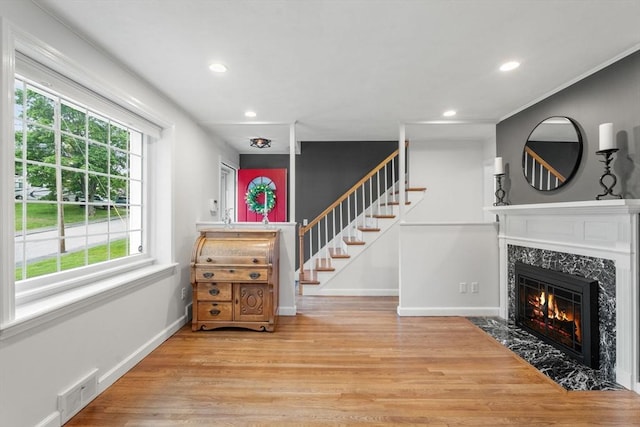 37 Benjamin, Marlborough, MA 01752 - entryway featuring recessed lighting, wood finished floors, a high end fireplace, baseboards, and stairway