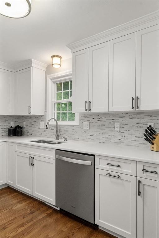 37 Benjamin, Marlborough, MA 01752 - kitchen with dishwasher, a sink, white cabinets, and backsplash