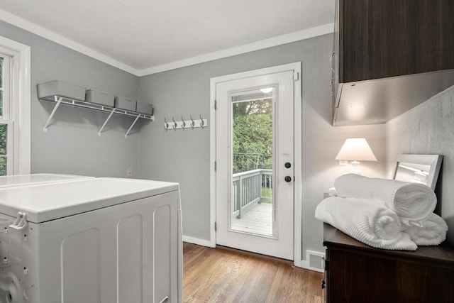 37 Benjamin, Marlborough, MA 01752 - washroom featuring washer / dryer, light wood-style floors, and baseboards