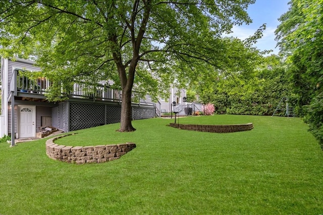 37 Benjamin, Marlborough, MA 01752 - view of grassy yard featuring a deck