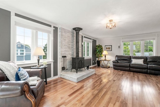 37 Benjamin, Marlborough, MA 01752 - living area with plenty of natural light, wood finished floors, and a wood stove