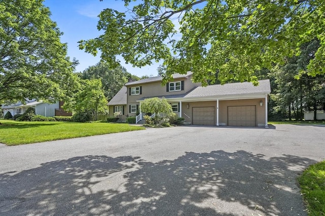 2-4 Founders Rd, Shrewsbury, MA 01545 - traditional-style home with an attached garage, a front lawn, and driveway