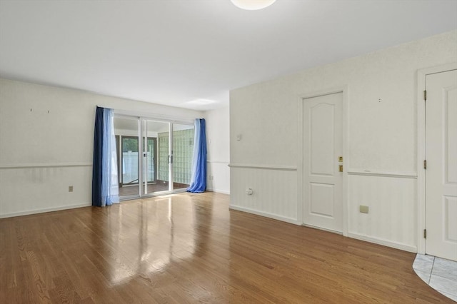 2-4 Founders Rd, Shrewsbury, MA 01545 - empty room featuring wood finished floors and wainscoting