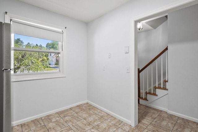 2-4 Founders Rd, Shrewsbury, MA 01545 - empty room with stairs and baseboards