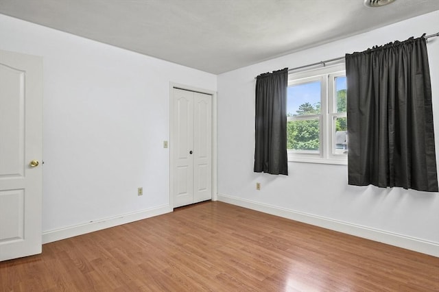 2-4 Founders Rd, Shrewsbury, MA 01545 - empty room featuring wood finished floors and baseboards