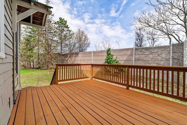 wooden deck with a yard