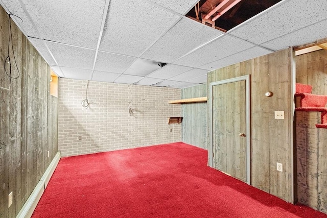 178 Elliot Ave, Quincy, MA 02171 - unfinished basement featuring carpet flooring, a paneled ceiling, and wood walls