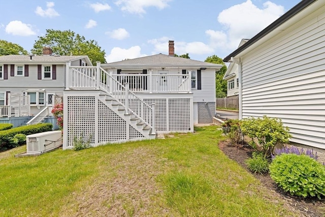 178 Elliot Ave, Quincy, MA 02171 - rear view of property with stairs, a yard, and a deck