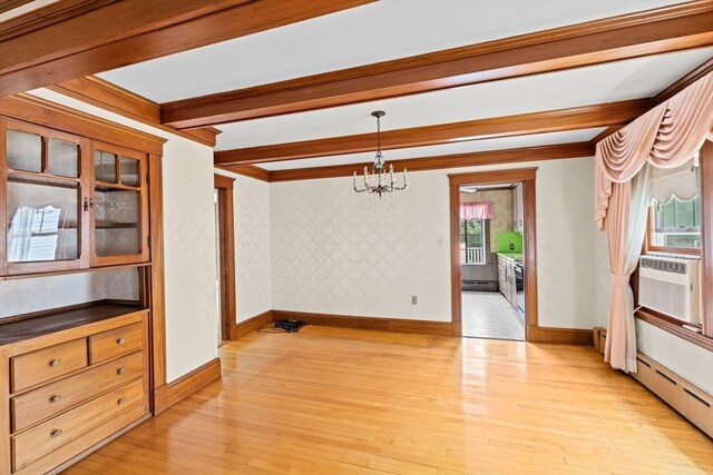 178 Elliot Ave, Quincy, MA 02171 - unfurnished dining area featuring a chandelier, baseboards, light wood-style floors, wallpapered walls, and beamed ceiling