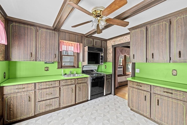 178 Elliot Ave, Quincy, MA 02171 - kitchen featuring stove, black microwave, a sink, a ceiling fan, and light countertops