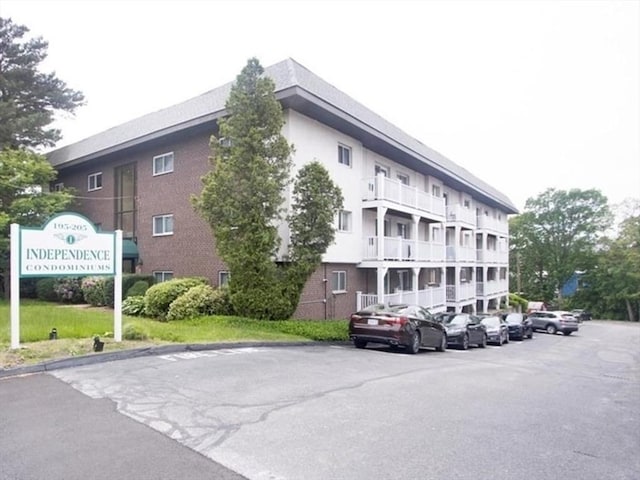 205 Independence Ave Unit 223, Quincy, MA 02169 - view of property featuring uncovered parking