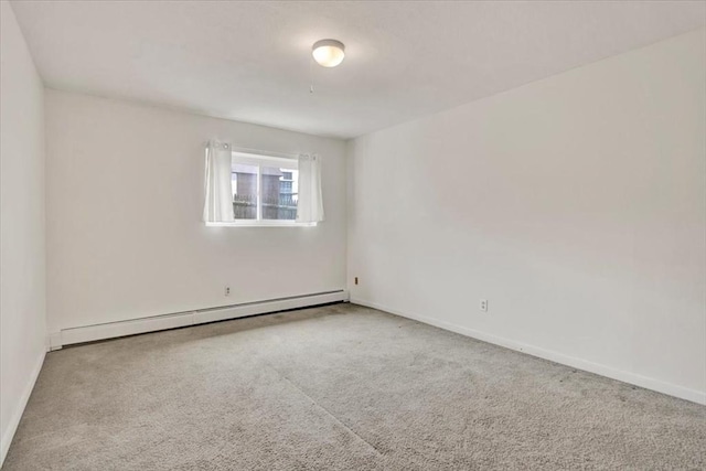 205 Independence Ave Unit 223, Quincy, MA 02169 - spare room with baseboard heating, carpet, and baseboards